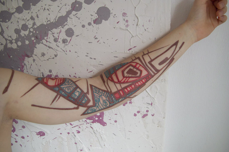 Татуировка от Григория Маслова на руке