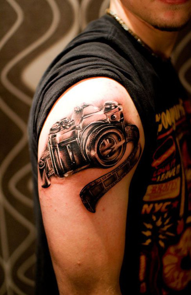Татуировка фотоаппарат