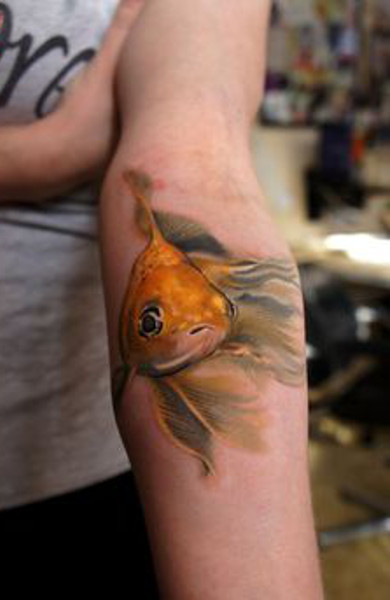 Татуировка золотая рыбка